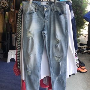 Light denim distressed skinny ankle jeans